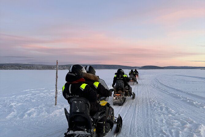 Day tour with snowmobile in Kiruna 10:30 am - Guides, Safety, and the Human Touch