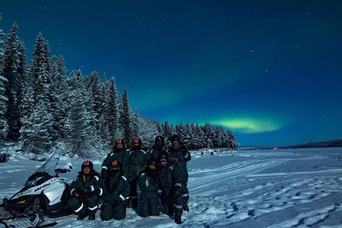 Snowmobile Aurora Expedition with dinner - Dinner in the forest hut: reindeer souvas and cloudberry dessert