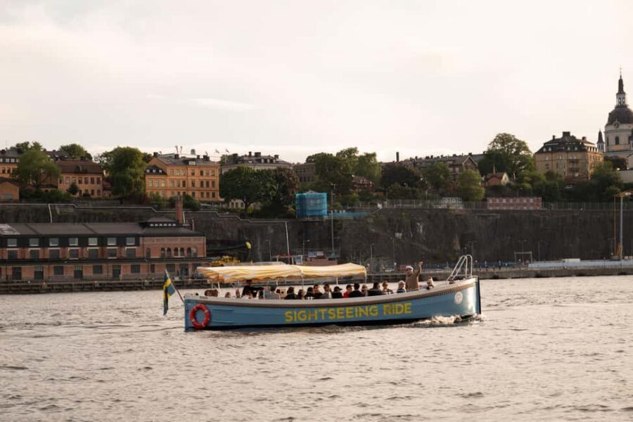 Stockholm: Guided City Sightseeing Open Electric Boat Tour - Skeppsholmen and the Nordic Museum Sighting From Canal Turns