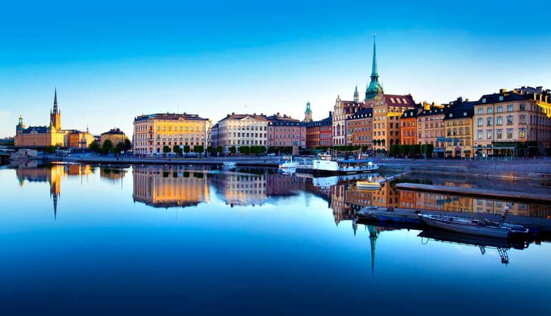 Stockholm: Old Town Historical Walking Tour - Gamla Stan essentials: cobblestones, a rune stone, and the German church